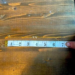 Beautiful 2 hearts CZ gold tone chain bracelet.